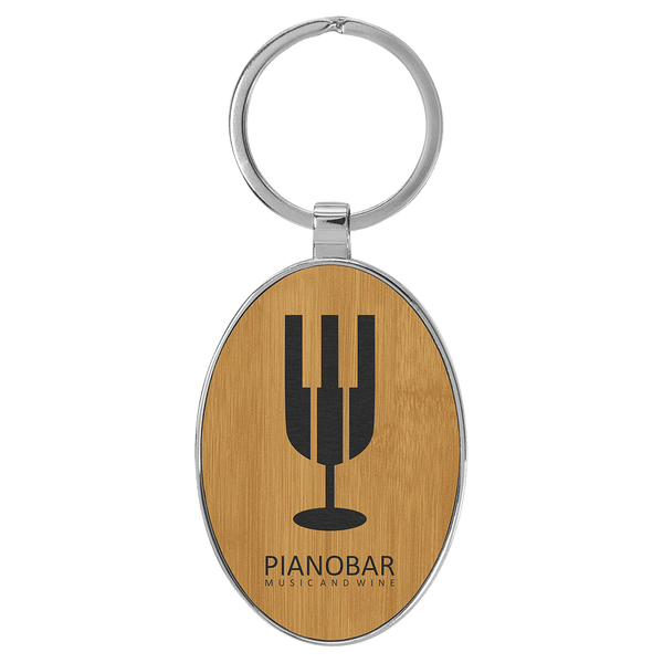 Bamboo 3" x 1 3/4" Laserable Leatherette/Metal Oval Keychain