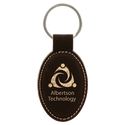 Black/Gold 3" x 1 3/4" Laserable Leatherette Oval Keychain
