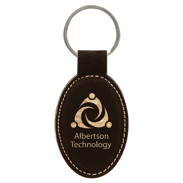 Black/Gold 3" x 1 3/4" Laserable Leatherette Oval Keychain